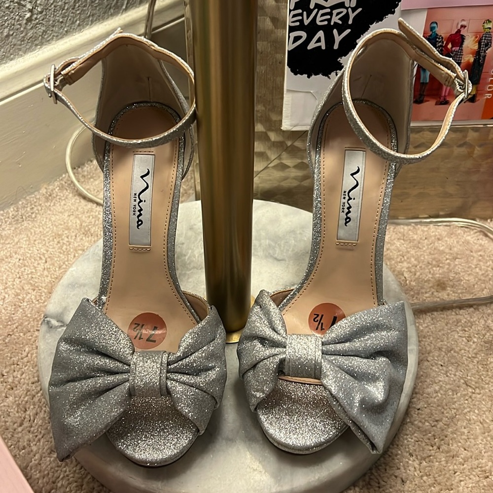 Silver bow stilettos